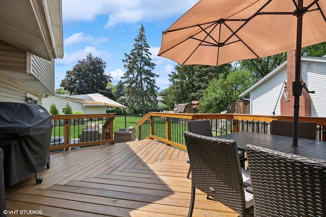 1426 E Kenilworth Ave, Palatine, IL 60074 - deck with a playground, area for grilling, a lawn, and outdoor dining area
