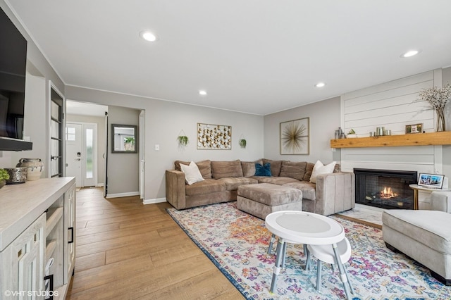 1426 E Kenilworth Ave, Palatine, IL 60074 - living room featuring light wood-type flooring, recessed lighting, and a large fireplace