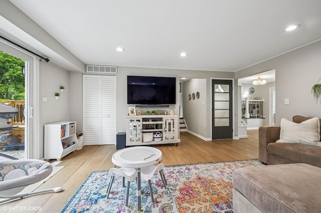 1426 E Kenilworth Ave, Palatine, IL 60074 - living room with wood finished floors, recessed lighting, and a chandelier