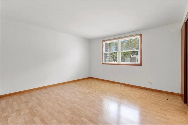 2049 Berkshire Cir Unit D, Carpentersville, IL 60110 - empty room with light wood-style floors