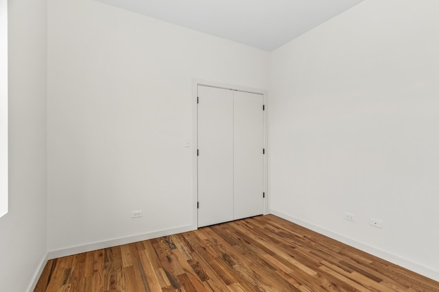 4316 S Michigan Ave Unit 1S, Chicago, IL 60653 - spare room with wood finished floors and baseboards
