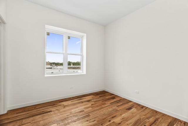 4316 S Michigan Ave Unit 1S, Chicago, IL 60653 - unfurnished room with wood finished floors and baseboards
