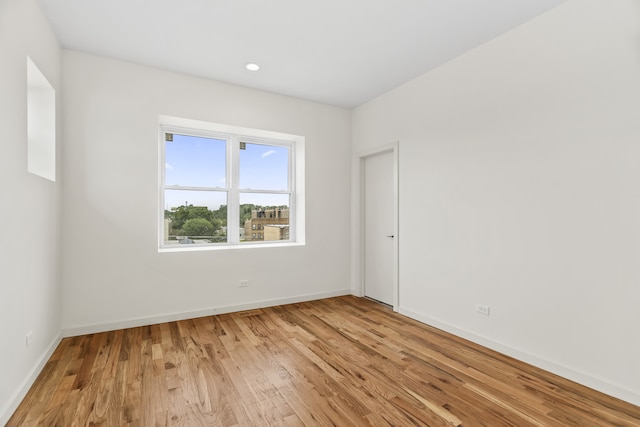 4316 S Michigan Ave Unit 1S, Chicago, IL 60653 - empty room featuring wood finished floors and recessed lighting