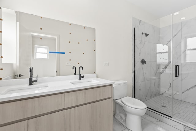 4316 S Michigan Ave Unit 1S, Chicago, IL 60653 - bathroom featuring marble look tile flooring, double vanity, and a marble finish shower