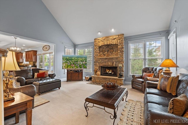 1108 Independence Ave, Elburn, IL 60119 - living room with light carpet, high vaulted ceiling, a stone fireplace, and recessed lighting