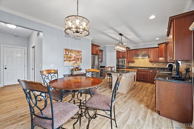 1108 Independence Ave, Elburn, IL 60119 - dining area featuring a chandelier, light wood-style flooring, ornamental molding, and recessed lighting
