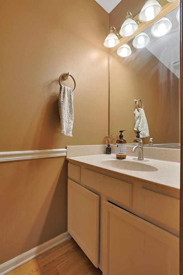 710 Cimarron Dr, Cary, IL 60013 - bathroom featuring vanity and wood finished floors
