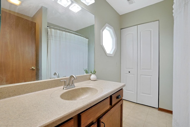 710 Cimarron Dr, Cary, IL 60013 - bathroom featuring vanity and tile patterned flooring