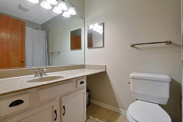 710 Cimarron Dr, Cary, IL 60013 - bathroom featuring tile patterned floors, vanity, and curtained shower