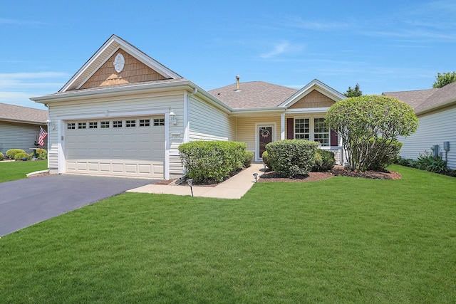 12856 W Rocksprings Ln, Huntley, IL 60142 - single story home with driveway, a front yard, and an attached garage