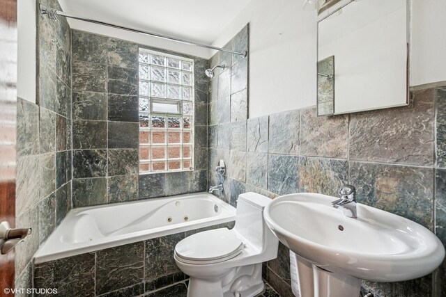 1734 W Erie St Unit 3, Chicago, IL 60622 - bathroom featuring tile walls and a combined bath / shower with jetted tub