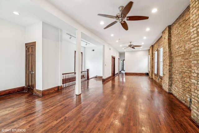 1734 W Erie St Unit 3, Chicago, IL 60622 - unfurnished living room with ceiling fan, brick wall, wood finished floors, and recessed lighting