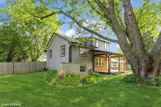 26W323 Harrison Ave, Winfield, IL 60190 - back of property featuring a wooden deck