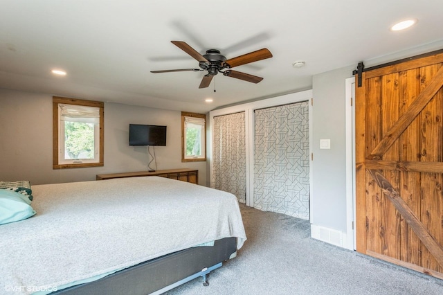 26W323 Harrison Ave, Winfield, IL 60190 - carpeted bedroom featuring a barn door, recessed lighting, multiple closets, and ceiling fan