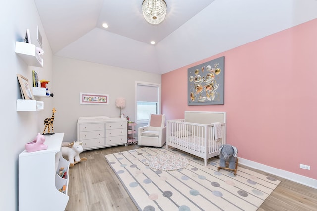 0N337 Herrick Dr, Wheaton, IL 60187 - bedroom featuring a nursery area, wood finished floors, lofted ceiling, and recessed lighting