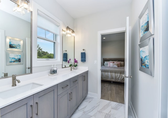 0N337 Herrick Dr, Wheaton, IL 60187 - full bathroom with double vanity, ensuite bath, and marble look tiles