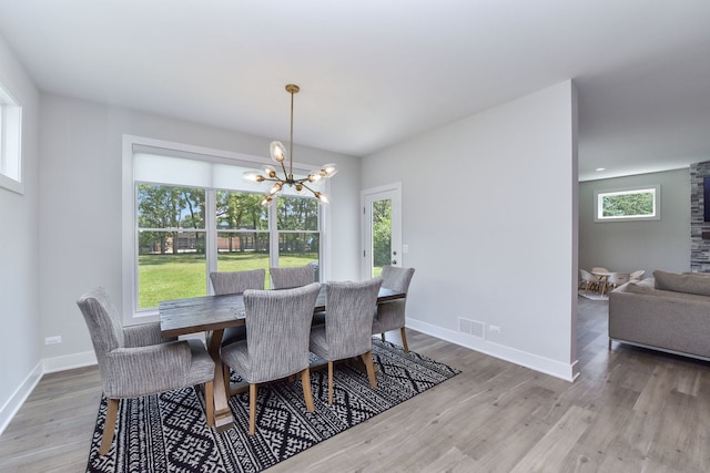 0N337 Herrick Dr, Wheaton, IL 60187 - dining room with a chandelier and wood finished floors