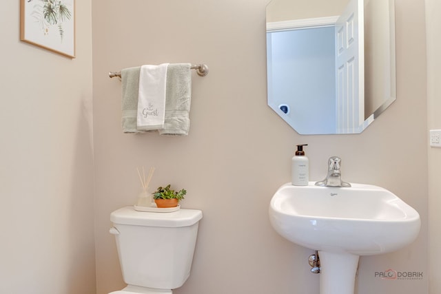 1174 Pine Tree Ct, Lake Villa, IL 60046 - bathroom with toilet and a sink