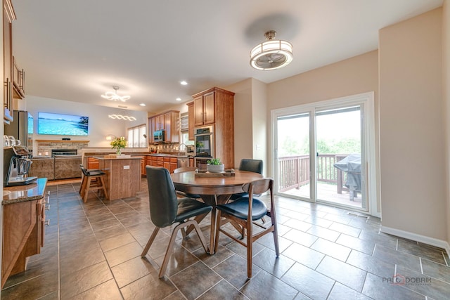1174 Pine Tree Ct, Lake Villa, IL 60046 - dining area with recessed lighting and dark tile patterned flooring