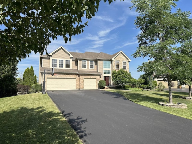 1174 Pine Tree Ct, Lake Villa, IL 60046 - view of front of home featuring an attached garage and driveway