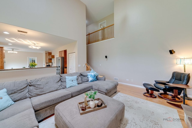 1174 Pine Tree Ct, Lake Villa, IL 60046 - living room featuring light wood-style floors and baseboards