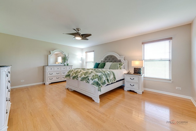 1174 Pine Tree Ct, Lake Villa, IL 60046 - bedroom with light wood-style floors and a ceiling fan