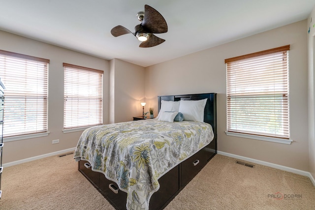 1174 Pine Tree Ct, Lake Villa, IL 60046 - carpeted bedroom with baseboards and a ceiling fan
