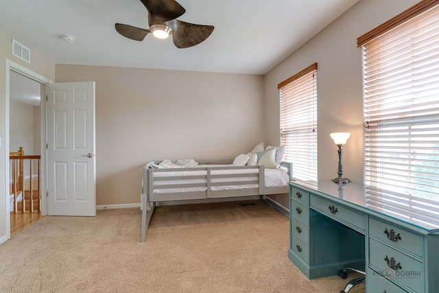 1174 Pine Tree Ct, Lake Villa, IL 60046 - bedroom with light colored carpet, an office area, and ceiling fan