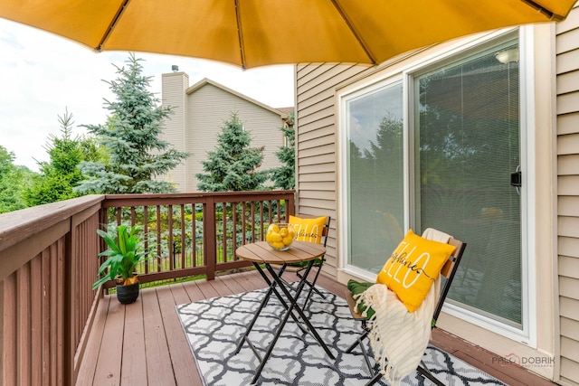 1174 Pine Tree Ct, Lake Villa, IL 60046 - view of wooden balcony with a deck