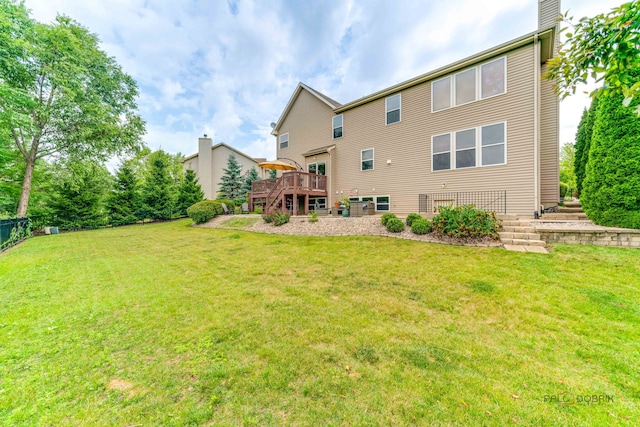 1174 Pine Tree Ct, Lake Villa, IL 60046 - rear view of house with a deck and a chimney