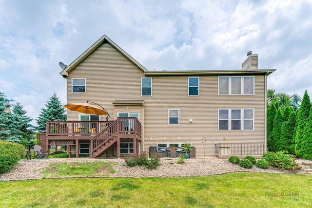 1174 Pine Tree Ct, Lake Villa, IL 60046 - back of property featuring a chimney, a deck, a yard, and stairs