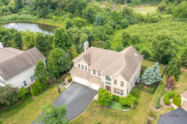 1174 Pine Tree Ct, Lake Villa, IL 60046 - aerial view of property and surrounding area featuring a nearby body of water and a heavily wooded area