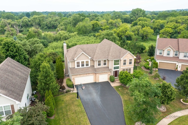 1174 Pine Tree Ct, Lake Villa, IL 60046 - view from above of property featuring a heavily wooded area