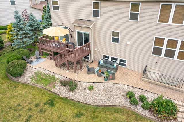 1174 Pine Tree Ct, Lake Villa, IL 60046 - rear view of property featuring a patio, a wooden deck, and an outdoor hangout area