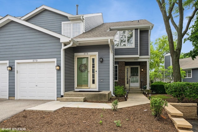 573 W Parkside Dr, Palatine, IL 60067 - multi unit property featuring a garage and asphalt driveway