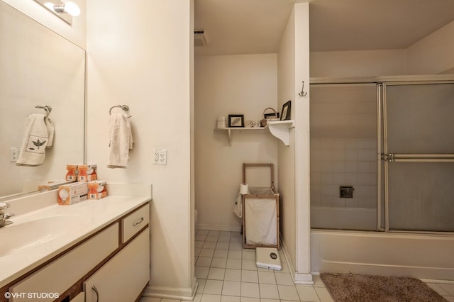 573 W Parkside Dr, Palatine, IL 60067 - bathroom with tile patterned floors, vanity, and combined bath / shower with glass door