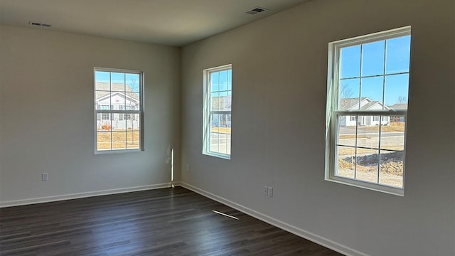 6471 Juniper Dr, Wonder Lake, IL 60097 - unfurnished room with dark wood-type flooring and baseboards