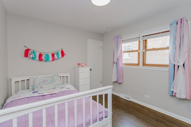 5246 N Mason Ave, Chicago, IL 60630 - bedroom with wood finished floors and baseboards