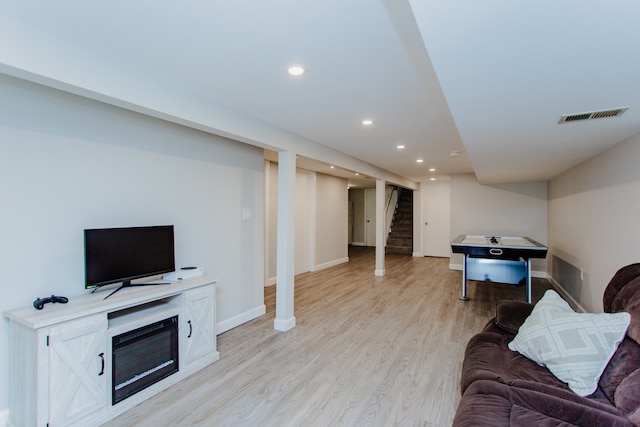 5246 N Mason Ave, Chicago, IL 60630 - living room featuring light wood-style floors, stairway, and recessed lighting