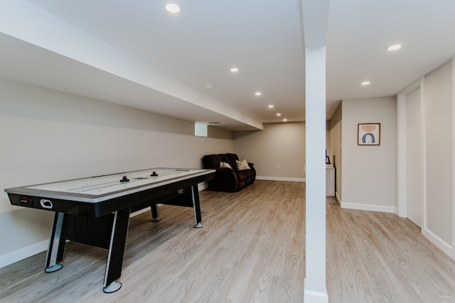 5246 N Mason Ave, Chicago, IL 60630 - game room with light wood-style floors and recessed lighting