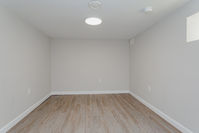 5246 N Mason Ave, Chicago, IL 60630 - spare room featuring wood finished floors and a smoke detector