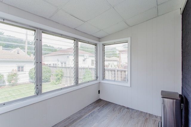 5246 N Mason Ave, Chicago, IL 60630 - unfurnished sunroom with wood finished floors, a paneled ceiling, and wooden walls