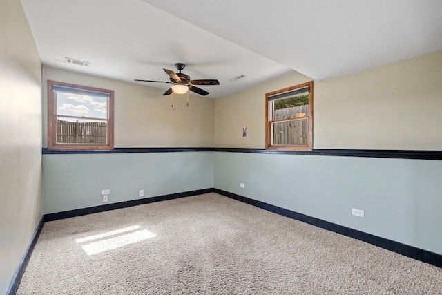 913 S Bentley Rd, New Lenox, IL 60451 - carpeted spare room featuring a ceiling fan and baseboards
