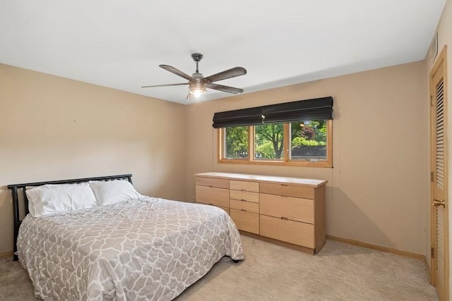 8850 Karlov Ave, Skokie, IL 60076 - bedroom with light carpet, a closet, and a ceiling fan