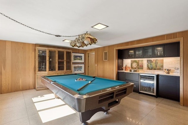 8850 Karlov Ave, Skokie, IL 60076 - playroom with beverage cooler, wooden walls, bar with sink, and pool table