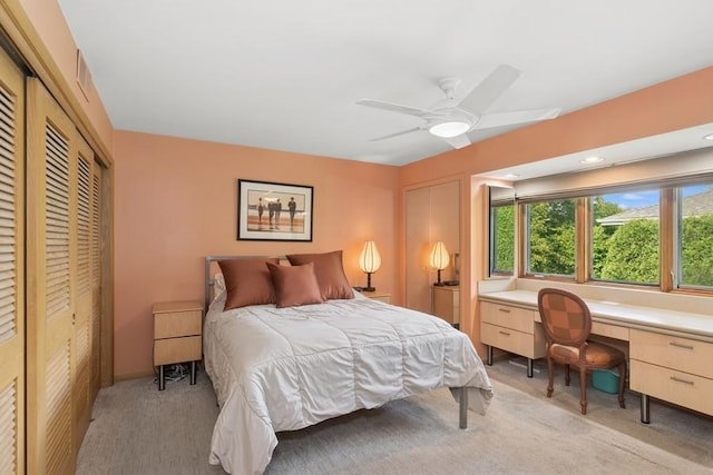 8850 Karlov Ave, Skokie, IL 60076 - bedroom with light carpet, a closet, built in desk, and a ceiling fan