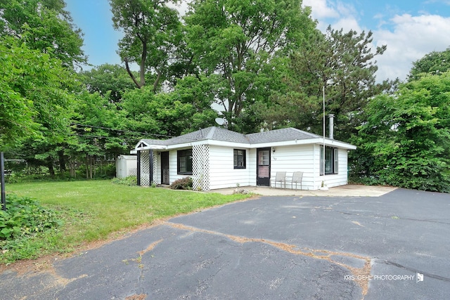 143 Eagle Point Rd, Fox Lake, IL 60020 - view of front facade featuring a front lawn