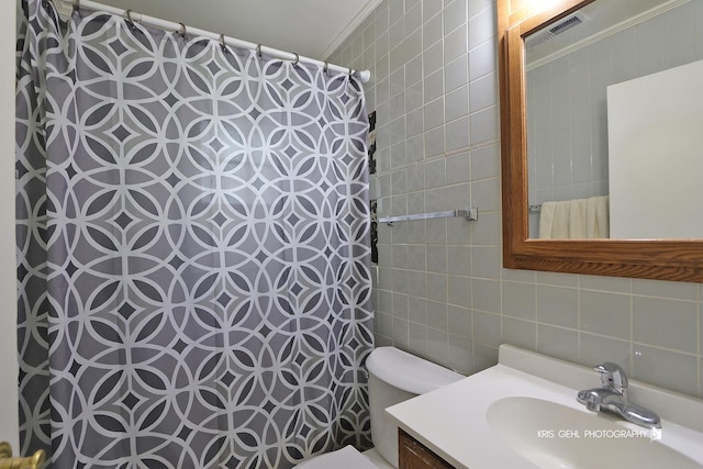 143 Eagle Point Rd, Fox Lake, IL 60020 - bathroom with tile walls, vanity, a shower with curtain, and decorative backsplash