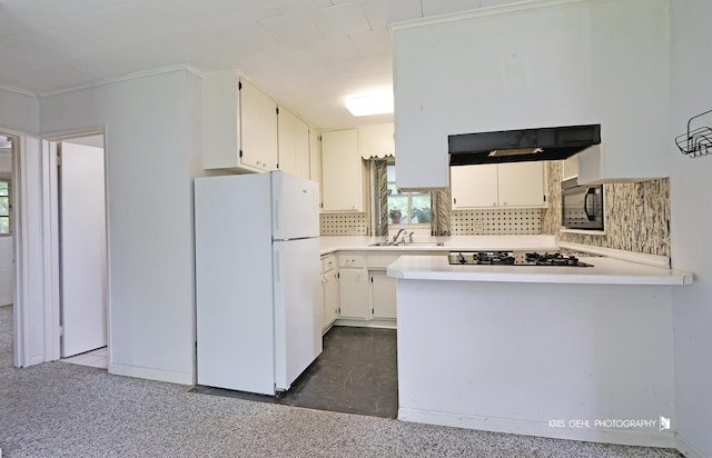 143 Eagle Point Rd, Fox Lake, IL 60020 - kitchen with freestanding refrigerator, gas stovetop, backsplash, and light countertops