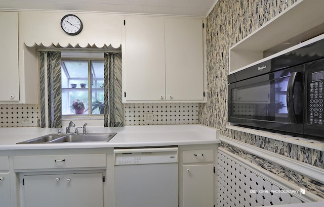 143 Eagle Point Rd, Fox Lake, IL 60020 - kitchen with dishwasher, black microwave, light countertops, and white cabinets